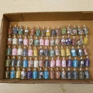 lot 64 image: approximately 75 small gemstone bottles