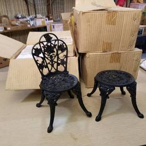 lot 81 image: 12 cast iron doll chairs and 12 cast iron doll tables - assembled units are for demonstration only