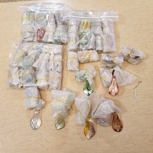 lot 87 image: approximately 200 assorted glass pendants