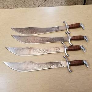 lot 95 image: 4 etched blade machetes