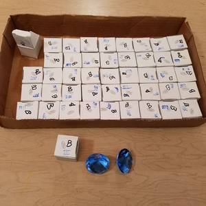 lot 97 image: 45 blue colored Jewels