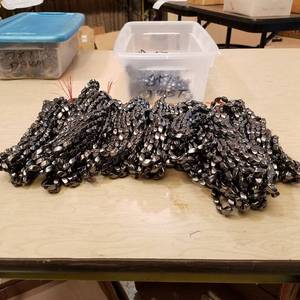 lot 100 image: approximately 130 count 8 by 12 twist magnetic jewelry beads