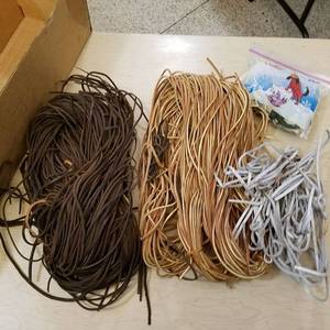 lot 108 image: large lot of assorted leather strips