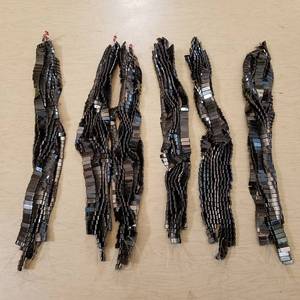 lot 111 image: approximately 60 strands of double hole magnetic jewelry beads