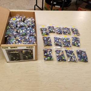 lot 121 image: approximately 66 bags of assorted glass beads