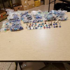 lot 124 image: large lot of assorted mini figurines on half Moons