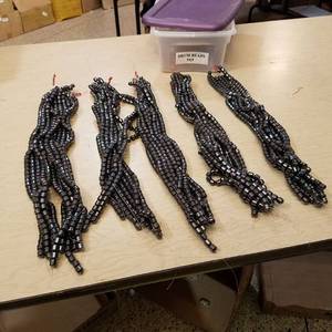 lot 125 image: approximately 50 strands of 9 by 9 m m drum beads
