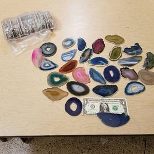 lot 175 image: approximately 70 flat polished geodes