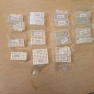 lot 177 image: 20 packages of 100 6 by 12 mm magnets