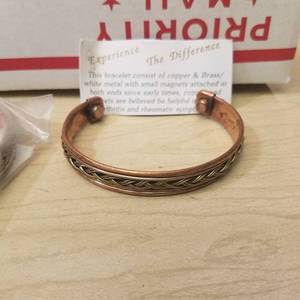 lot 223 image: 12 copper and brass bracelets
