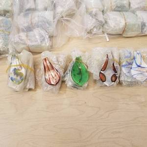 lot 235 image: approximately 150 assorted jewelry pendants - glass