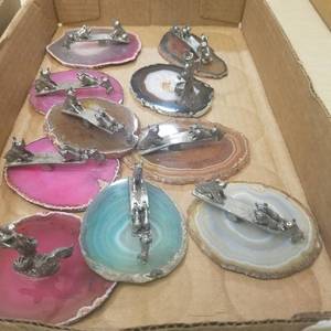 lot 266 image: approximately 15 miniature figurines on polished geode slabs