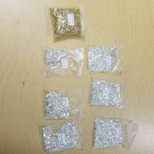 lot 2001 image: silver and gold colored jewelry beads