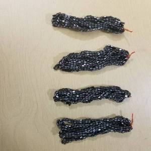 lot 2010 image: approximately 40 magnetic necklaces