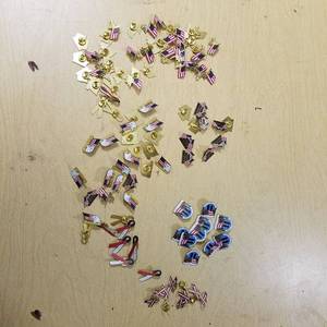 lot 2026 image: assorted USA themed pens - lapel  hat clasp - approximately 100 pieces