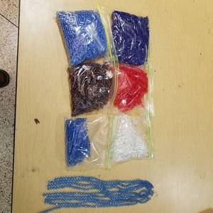 lot 2047 image: six bags of assorted stranded beads