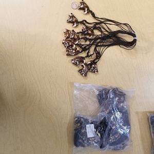 lot 2119 image: approximately 50 Eagle necklaces