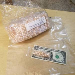 lot 2127 image: approximately 50 bracelets -  flat pearl beads bracelet