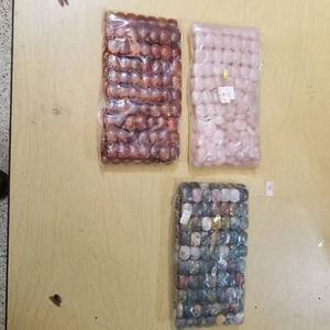 lot 2199 image: three bags of bracelets  beads