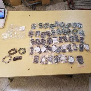 lot 2252 image: approximately 50 assorted 36in stranded beads - various colors