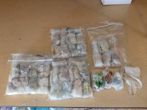 lot 148 image: Approximately 200 glass pendants - assorted colors