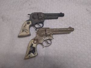 lot 11260 image: two vintage Texan junior cap guns revolvers one for parts