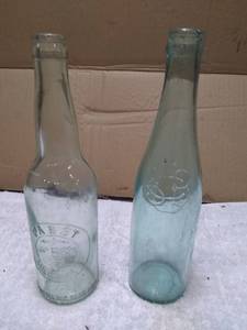 lot 11293 image: Pair of Vintage Beer Bottles Pabst and Cleveland & Sandusky