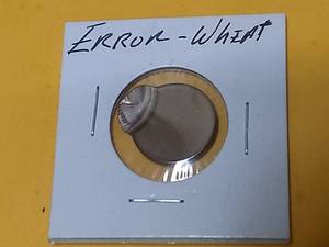 lot 11317 image: US Wheat Penny Die Error Offset
