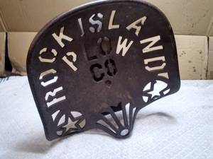 lot 11399 image: Antique Rock Island Plow Cast Iron Seat