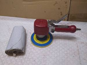 lot 11414 image: 6  Pneumatic Rotary Sander and a Roll Sandpaper Pads