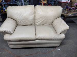 lot 3514 image: BeigeIvory Leather Loveseat in Excellent Condition