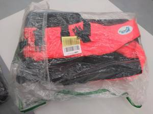 lot 1010 image: BCVE Dolphin orange life jacket unknown size