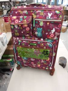 lot 1079 image: lily bloom bag karma Bloom fabric made of recycled plastic bottles a purple animal pattern lightweight handle rolling bag