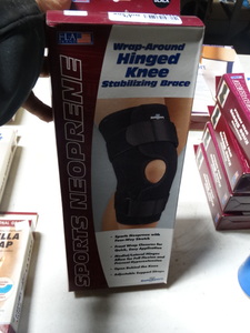 lot 7906 image: F-L-A medical wrap around hinged knee stabilizing brace- New in box- Size- M