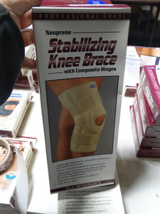 lot 7909 image: Pro- neoprene stabilizing knee brace- New in box- size L