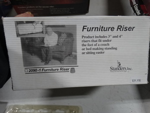 lot 7948 image: Furniture riser- new in box