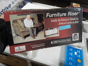 lot 7949 image: Furniture riser- new in box