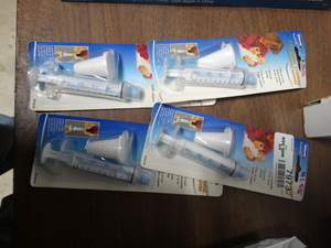 lot 7973 image: 4 new in package 2 tsp oral syringe w bottle adapters