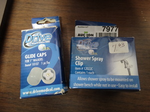 lot 7977 image: Drive Medical- glide caps for walkers & shower spray clip-NEW in box