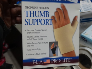 lot 8042 image: FLA Orthopedics Neoprene pull on thumb support- Size XL- New in box