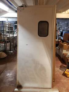 lot 5677 image: (3) Swinging Kitchen Doors