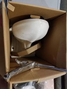 lot 5716 image: Sink Faucet, Base Of Toilet