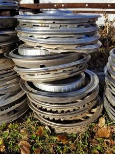 lot 5838 image: Pile Of Antique Hub Caps