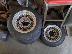 lot 5906 image: (4) 14 Inch Rims With 15580R13 Tires