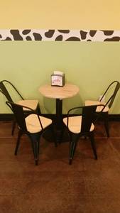 lot 36 image: Wood Grain and Steel Table with Four Chairs