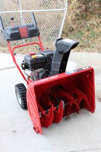 lot 3166 image: Troy-bilt Storm 24 inch SnowBlower - Electric Start