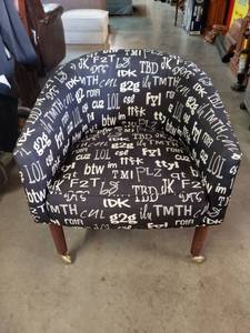 lot 1038 image: Black Accent Chair with Chic Wording