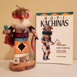 lot 4160 image: Native American Roast Corn Kachina Doll by MY- 10 in. tall and Hopi Kachinas book by Barton Wright
