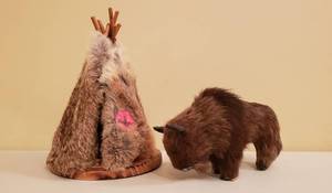 lot 4162 image: Lot of Original Hide Buffalo Figurine (8 in. x 3 in. x 5 in.) and Indian Tepee (Rabbit Fur) - 10 in. tall