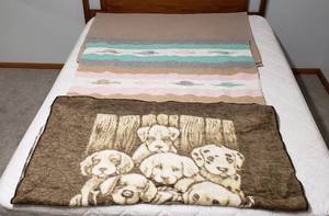 lot 4186 image: Lot of Throw Blankets - 1 Acrylic Dogs (50 in. x 60 in.), 1 Cotton Birds (44 in. x 72 in.), and 1 Polyester Tan Brown Plain (48 in. x 64 in.)